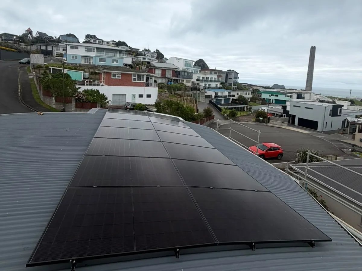 A 6.37kW EFS Solar array on a metal roof in New Plymouth, Taranaki, on a coastal hillside
