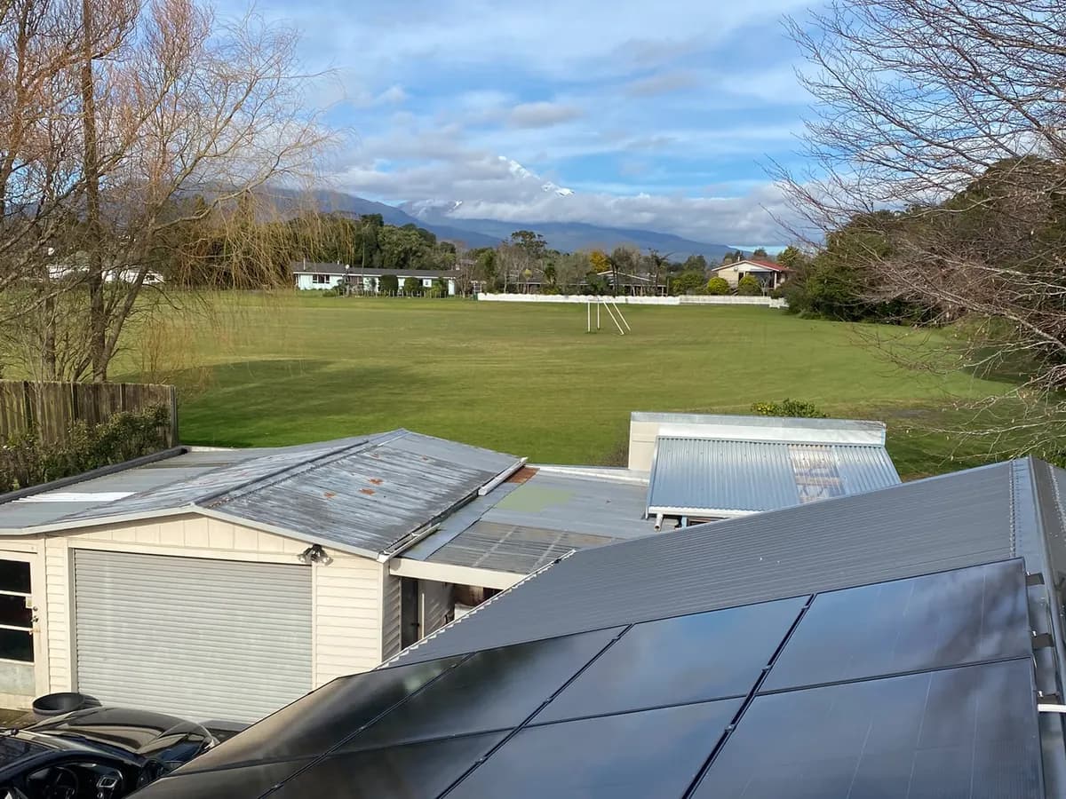A 6.83kW EFS Solar array on a home at Ōkato, Taranaki, with Mount Taranaki behind