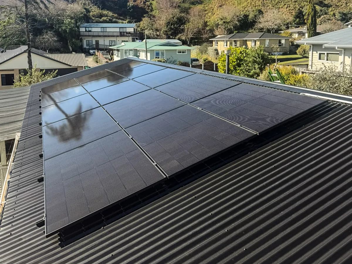 A 6.83kW EFS Solar array on a home at Westown, New Plymouth, with the hillside behind